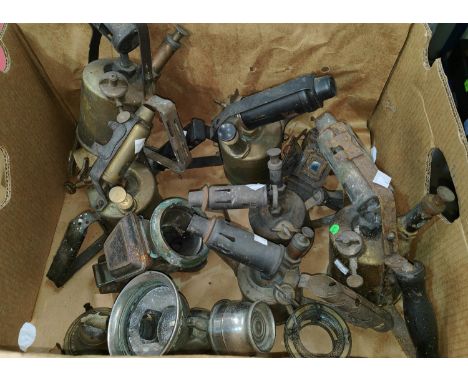 A collection of vintage brass blow lamps; vintage lamps; etc. 