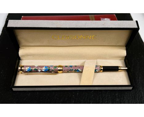 An original boxed "Cloisonne" rollerball pen; a pair of cut glass trinket jars with hallmarked silver and tortoiseshell lids 