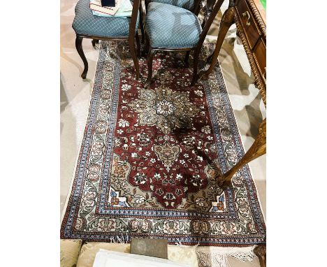 A modern red ground Persian design oriental carpet, length 185cm, width 116cm