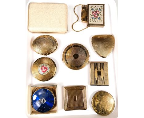 A collection of vintage Kigu compacts and sets:&nbsp; needlepoint compact/lipstick holder and cigarette case; a needlepoint c