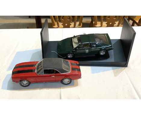 An American Muscle 1:18 scale diecast model 1967 Camaro Z-28 in box and an Auto Art 1:18 scale Lotus Esprit, boxed. 