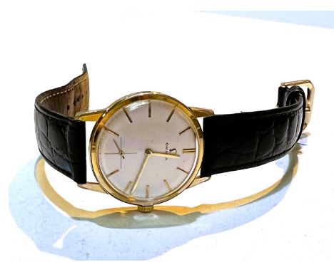 A gents Omega manual wind watch, in a stainless steel case, 33 mm, on a leather strap. 
