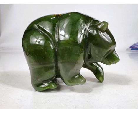 A Nephrite Jade carved bear with etched marks to feet length 10cm 