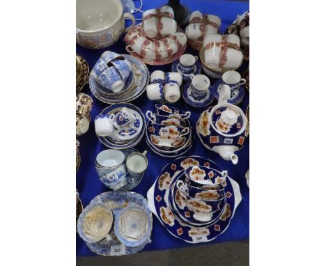 Six Royal Worcester coffee cups and trembluese saucers, assorted antique blue and white teawares, a Victorian pink and white 