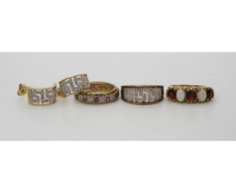 A 9ct gold opal and garnet ring, size O1/2, a 9ct gold diamond accent key pattern ring with matching earrings, size P1/2, and