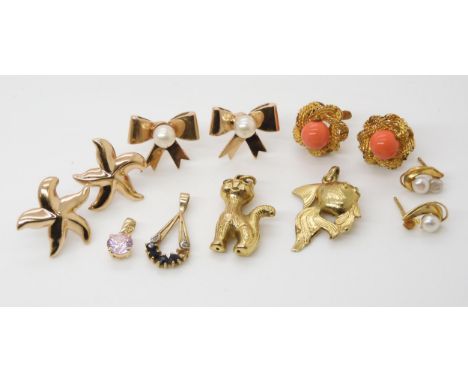 Three 9ct pendants, cat, fish and sapphire, two pairs of 9ct earrings, weight combined 16.7gms, together with a 14k gold pink