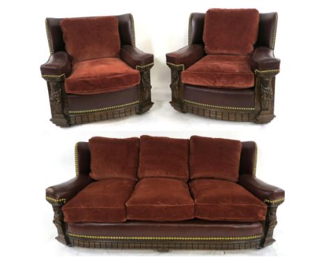 AN EARLY 20TH CENTURY OAK FRAMED THREE PIECE SUITE  consisting three seater sofa 82cm high x 182cm wide x 102cm deep and two 