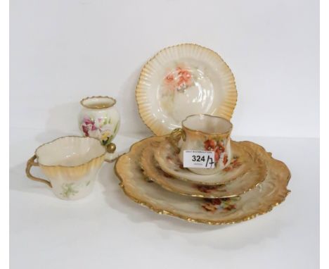 A collection of Nautilus porcelain including a trio decorated with poppies, another with a shaped rim, a plate with a crimped