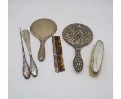 A collection of silver including a silver hand mirror with engine turned decoration surrounding a monogrammed cartouche, Birm