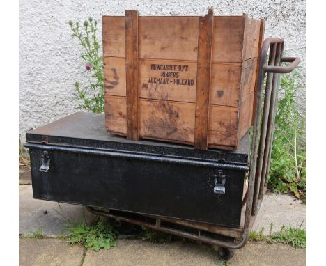 A 20th century steel freight trolley, metal travel trunk and a wooden freight crate (3) Condition Report:Available upon reque