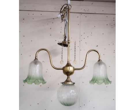 A Victorian brass ceiling light fixture with moulded glass shades Condition Report:Available upon request