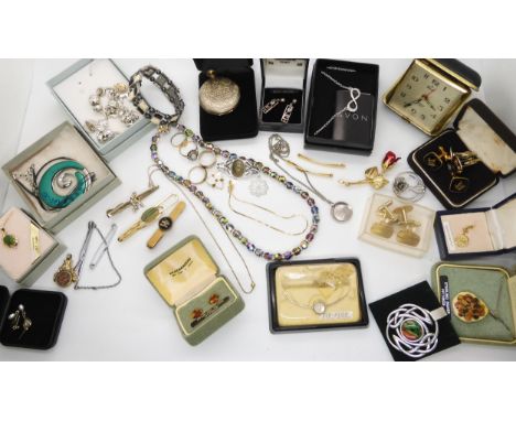 A collection of vintage costume jewellery to include masonic cufflinks, a bowling tie clip, a travelling alarm clock etc Cond