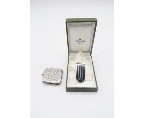 A Christofle Paris silver Art Deco money clip, with box, and a silver vesta, with engraved scrolling decoration, Birmingham 1