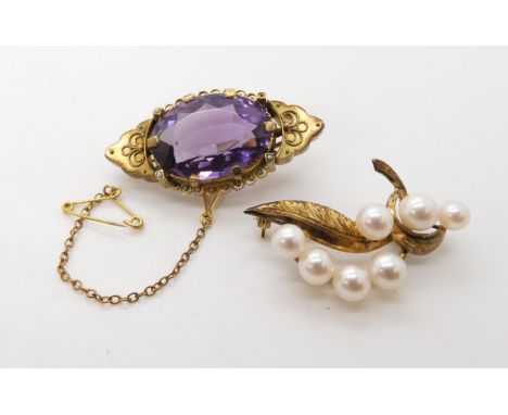 A 9ct gold amethyst brooch, weight 11.3gms, together with a gold plated silver pearl brooch Condition Report:Available upon r