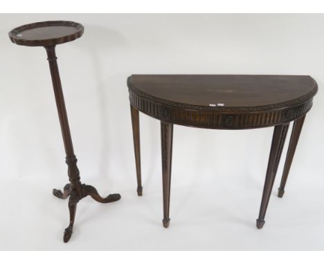 A 20th century mahogany demi lune occasional table and a mahogany plant stand on tripod base (2)Condition Report:Available up