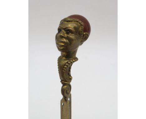 A brass work book mark, the African head set with carnellion together with a cased sewing kit, crotchet hook and a compact Co