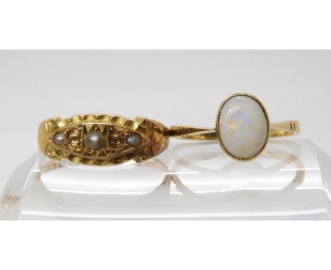 A 15ct gold pearl ring (three missing) hallmarked Birmingham 1890, size R1/2, weight 2.9gms together with a 9ct white opal ri
