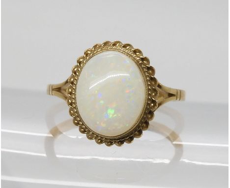 A 9ct white opal ring, size P, weight 3.3gms Condition Report:Available upon request