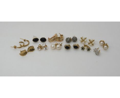 A collection of 9ct and yellow metal gem and pearl set earrings, weight together 9.6gms Condition Report:Available upon reque