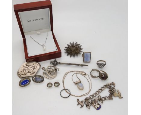 A silver Ola Gorie brooch, a silver charm bracelet, with attached silver charms, a Hot Diamonds silver diamond and pearl pend