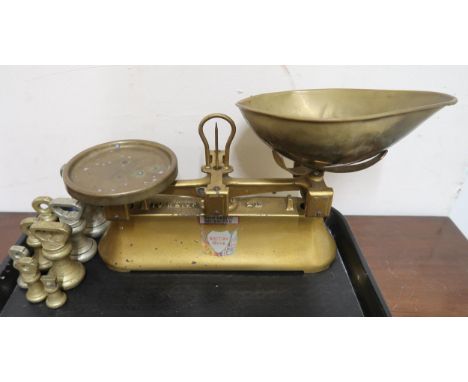 A 20th century set of British made scales with assorted weights and a 1968 Centenary cheese board Condition Report:Available 