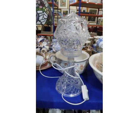 A crystal lamp and shade Condition Report:Available upon request