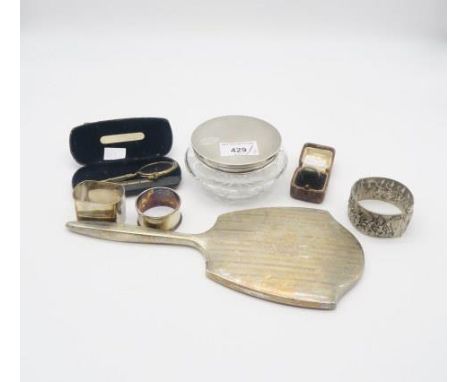 A collection of silver including a silver topped cut glass jar, the lid with engine turned decoration, by W.G Sothers Ltd, Bi