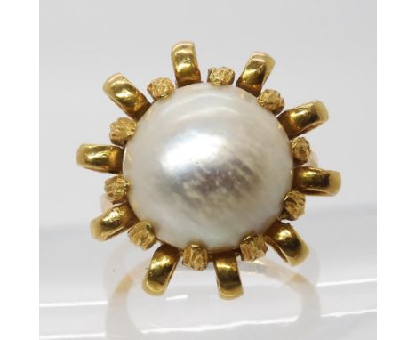 A bright yellow mabe pearl ring, stamped both 750 and 18k, size L1/2, weight 10.9gms Condition Report:Available upon request