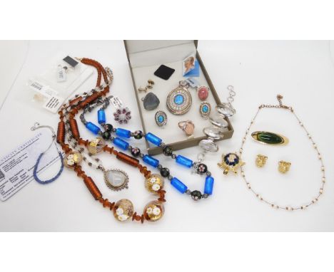 A collection of Gems TV style jewellery to include a sapphire bracelet with Gemporia certificate, a pendant and earring set w