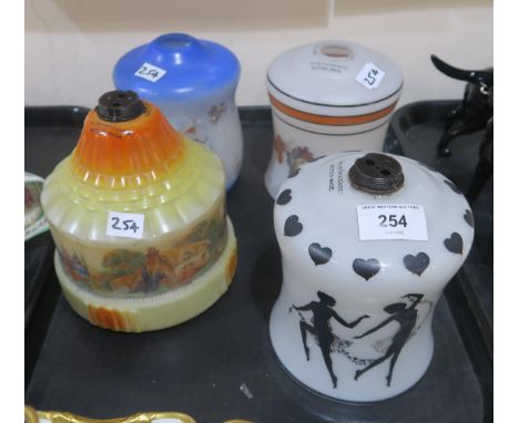 A Hailglass lamp shade decorated with silhouettes of fairy's and three other shades Condition Report:Not available for this l