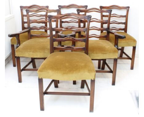 A set of six (4 + 2) 18th century style (later reproductions) mahogany dining chairs with stuff-over seats and ladder backs.