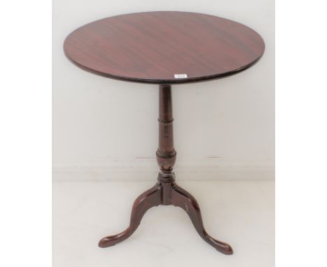 A circular mahogany-topped tilt-top occasional table on tripod base (60.5 cm diameter).