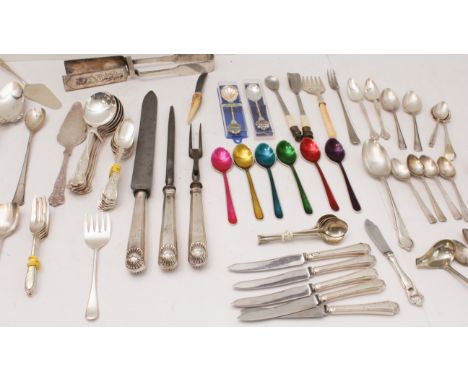 An assortment of mostly late 19th to early 20th century silver-plated flatware and cutlery to include:five fruit knives with 