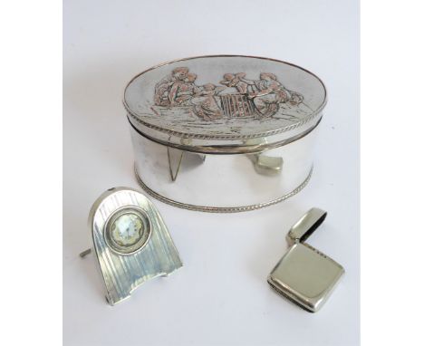 A hallmarked silver easel watch holder, Birmingham 1914 containing a lady's silver-cased fob watch and a hallmarked silver ve