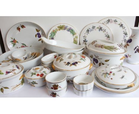 A mixed lot of Royal Worcester (mostly 'Evesham'):'Evesham':1 x 34 cm bowl;4 lidded tureens (the largest 30.5 cm wide x 18 cm