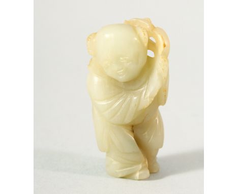 A SMALL CHINESE CARVED JADE FIGURE OF A BOY, possibly Ming Dynasty, 5.5cm high.
