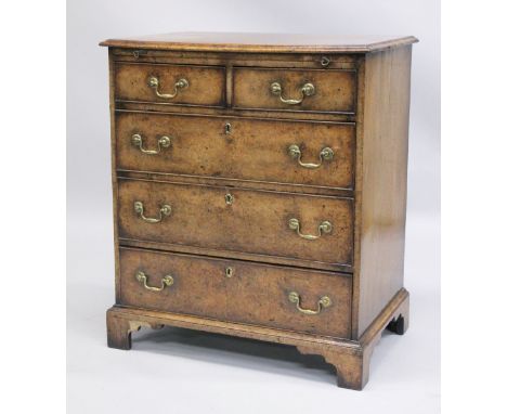 A GOOD 18TH CENTURY STYLE WALNUT CHEST OF DRAWERS with a moulded top, brushing slide, two short and three long graduated draw