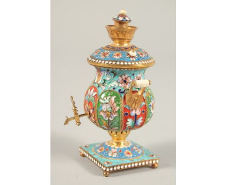 A SMALL RUSSIAN SILVER GILT AND ENAMEL SAMOVAR. 4ins.