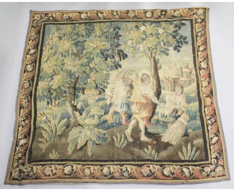 A GOOD LARGE 18TH CENTURY AUBUSSON TAPESTRY WALL HANGING with three central figures carrying sheaves of corn, in a woodland s