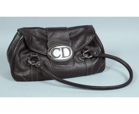 A CHRISTIAN DIOR LEATHER BAG. 11ins long.