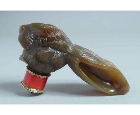 A SUPERB RUSSIAN SILVER AND HARDSTONE RABBIT HANDLE, with enamel and ruby eyes. 14cm long, 7cm high Mark: E K. 88, Faberge ma