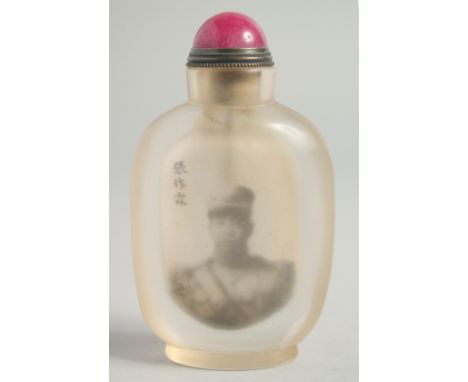 A CHINESE SNUFF BOTTLE with a portrait and calligraphy. 9cm high.