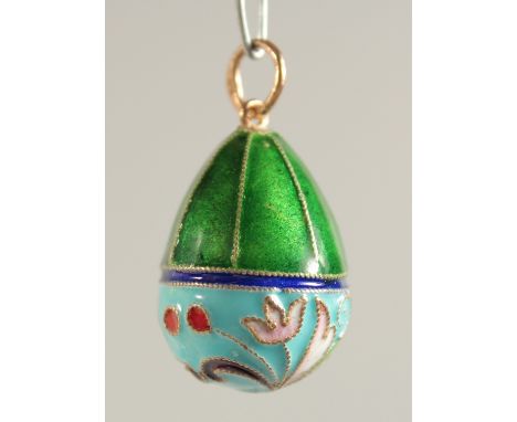 A SILVER AND ENAMEL EGG PENDANT