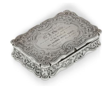 A Victorian silver snuff box, Birmingham, 1860, Frederick Marson, of shaped rectangular form, the lid with presentation engra