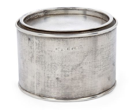An Asprey & Co. novelty silver 'paint tin' tea caddy, Birmingham, 1933, of cylindrical form, designed with engine-turned lid 