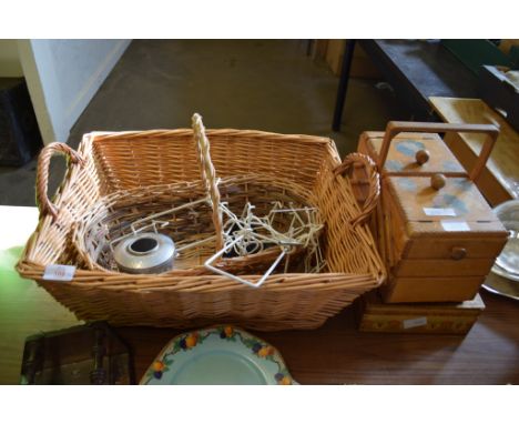 LARGE WICKERWORK BASKET AND SMALLER BASKET CONTAINING SERIES OF PLATE STANDS