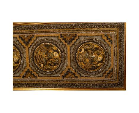 Elaborately embroidered wall tapestry featuring multiple people. Figures are padded and appear as relief. Embroidered with se