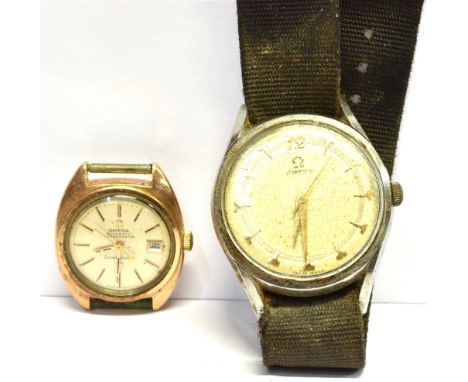 TWO GENTLEMANS OMEGA WRISTWATCHES A vintage Omega Automatic Chronometer constellation watch head, rimmed in gold or gold plat