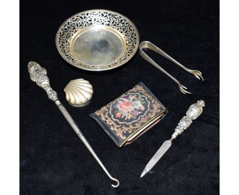 A COLLECTION OF SILVER  Comprising of an Edwardian Silver fronted miniature common prayer book, a Victorian silver handled fi