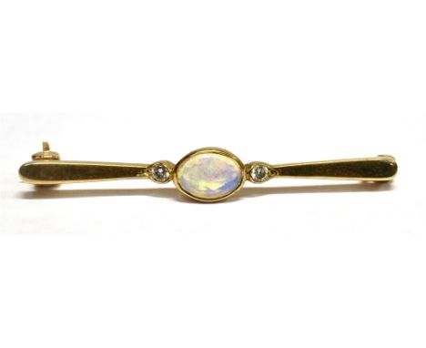 A DIAMOND AND OPAL SET BAR BROOCH  the central oval opal measuring 0.8cm by 0.5cm and flanked each side with a tiny diamond o